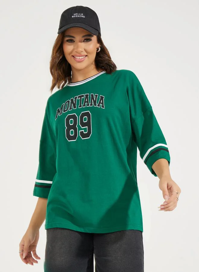 Styli Oversized Montana Slogan T-Shirt with Exaggerated Sleeves