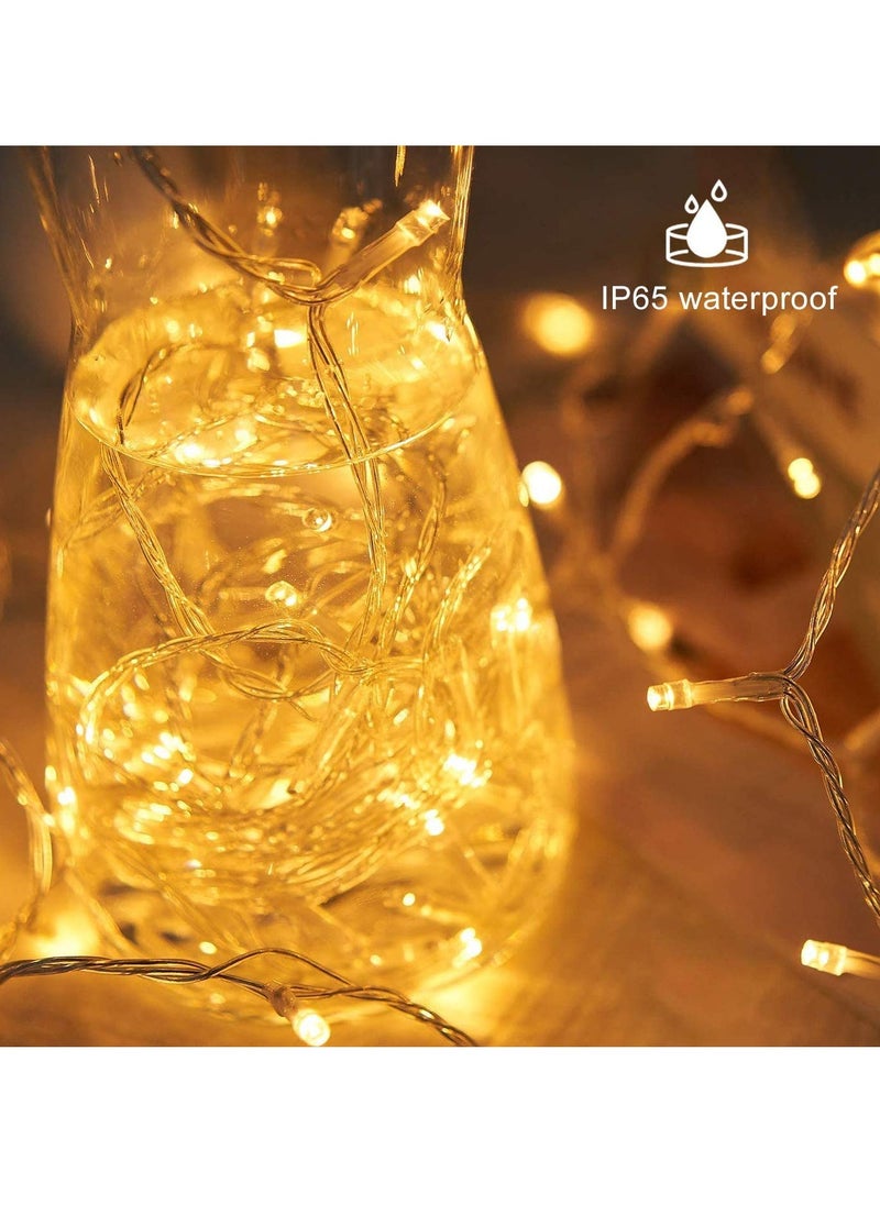 بامير - سلسلة مصابيح LED بيضاء دافئة تعمل ببطارية AA بطول 7 أمتار و50 مصباح LED لعيد الميلاد وعيد الميلاد ورمضان وشجرة عيد الميلاد لديوالي وديكورات الزفاف المنزلية ووضعين وزر تشغيل وإيقاف في صندوق البطارية - Image 1