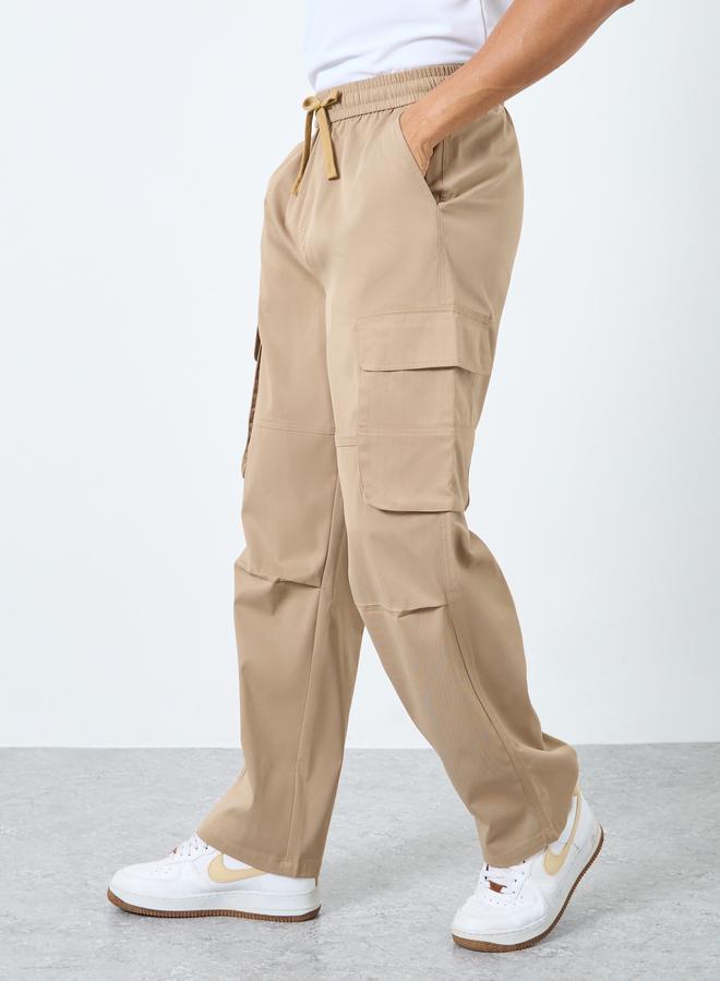 Styli Men Beige Woven Relaxed Fit Open Hem Joggers - Image 1