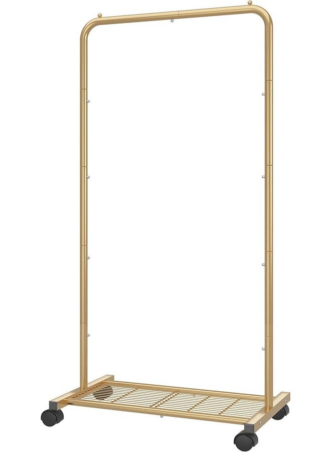سيمبل تريدنج رف ملابس قياسي بسيط وعصري، رف ملابس متحرك مع رف تخزين شبكي بعجلات، لون أصفر ذهبي - Image 1