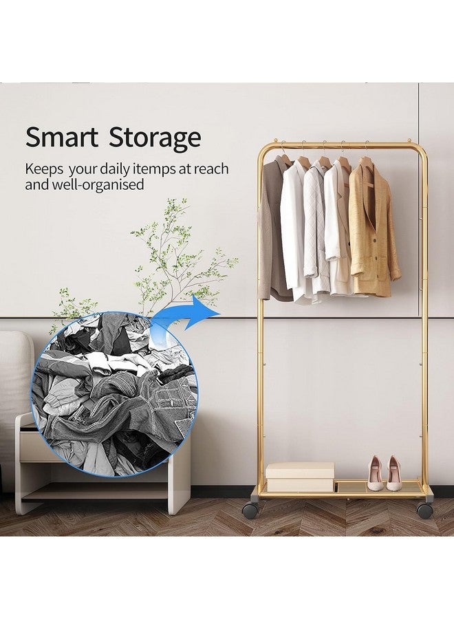 سيمبل تريدنج رف ملابس قياسي بسيط وعصري، رف ملابس متحرك مع رف تخزين شبكي بعجلات، لون أصفر ذهبي - Image 3