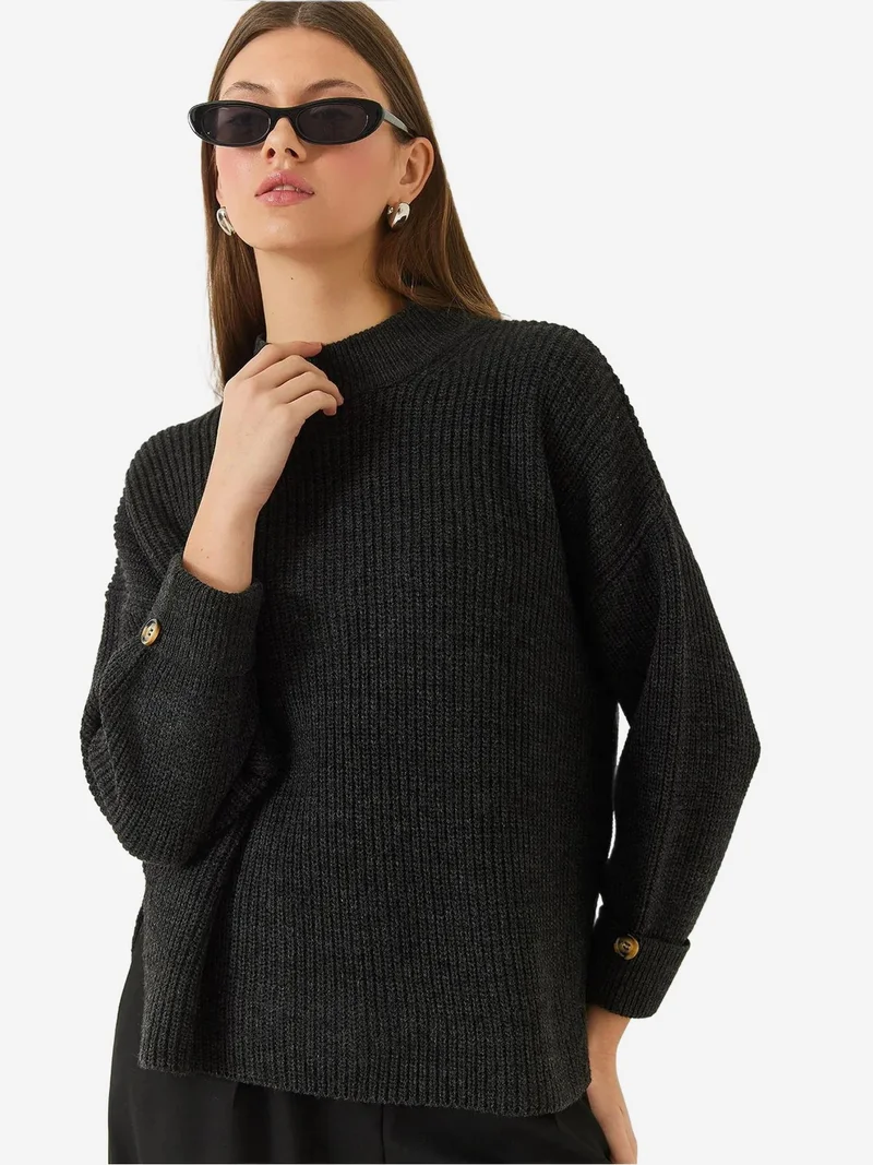 بيانكو لوتشي كنزة برقبة نصف عالية محبوكة بنقوش مع أزرار