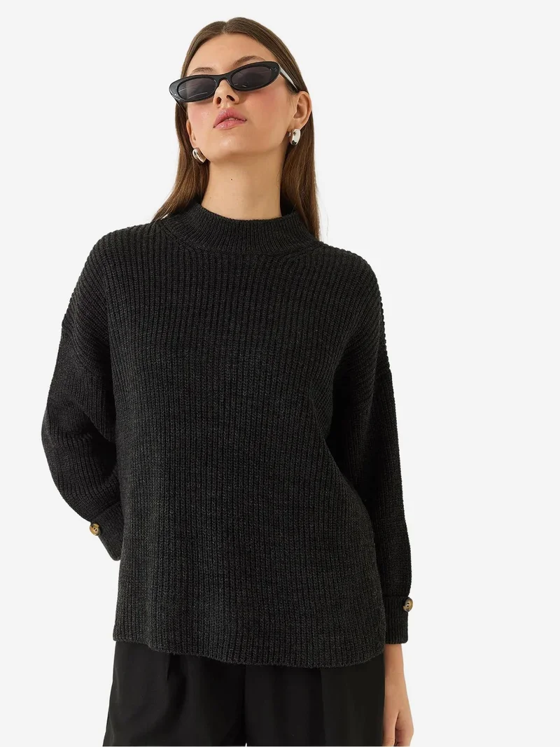 بيانكو لوتشي كنزة برقبة نصف عالية محبوكة بنقوش مع أزرار