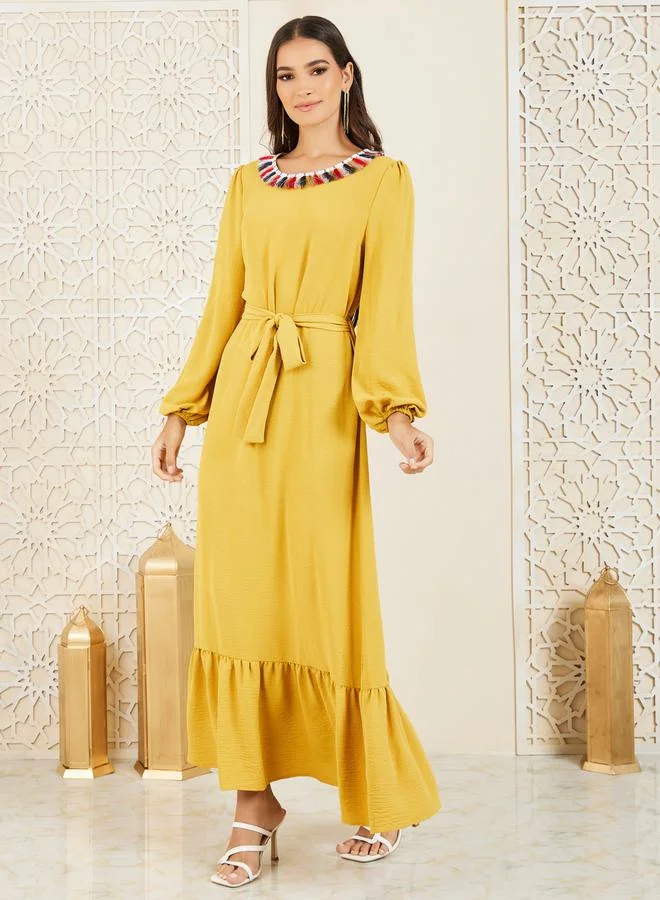 Styli Tassel Detail Neck A-Line Maxi Dress with Self Tie Up