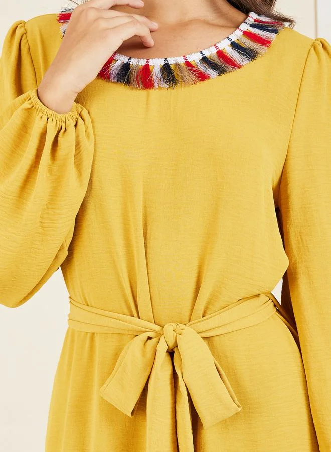Styli Tassel Detail Neck A-Line Maxi Dress with Self Tie Up