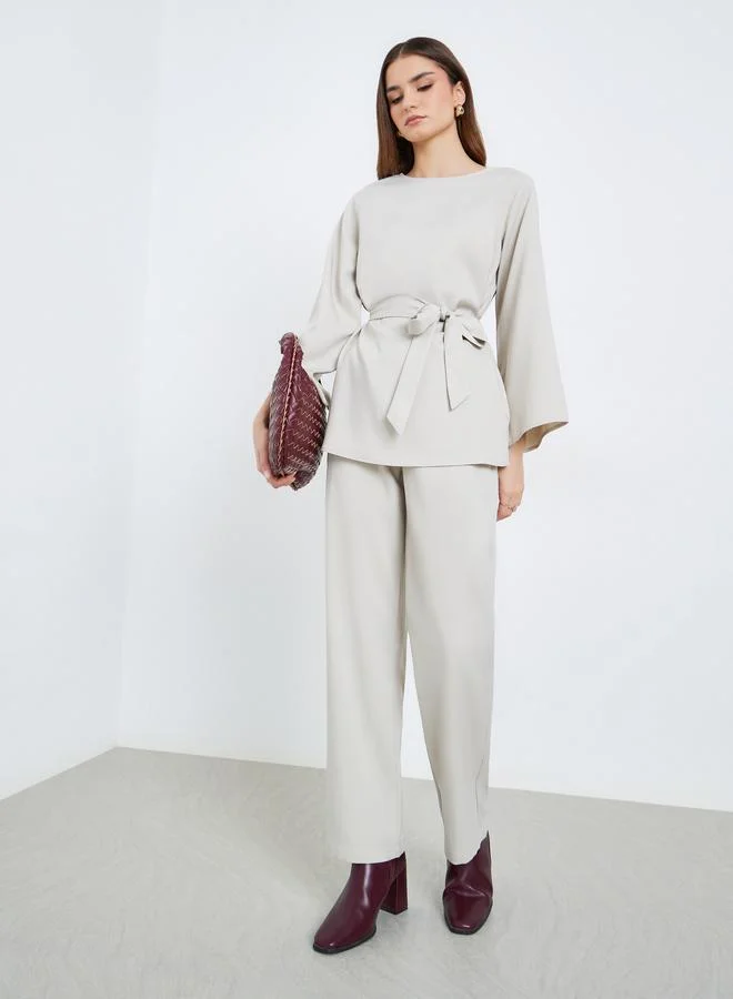 ستايلي طقم منسق من بلوزة طويل وبنطال بأرجل واسعة