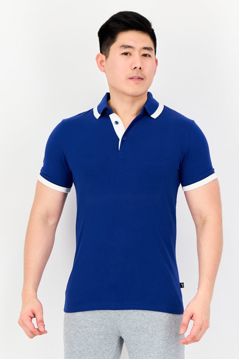 PUMA Men Sportswear Fit Short Sleeves Outdoor Polo Shirt, Blue - Image 1