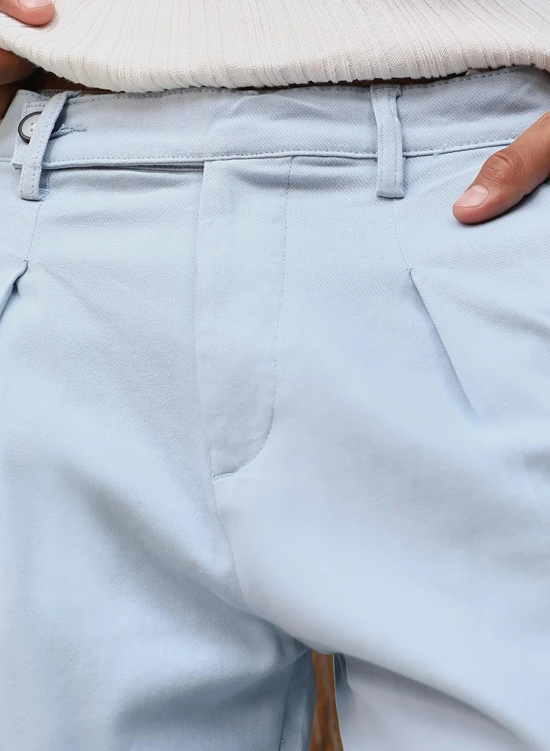 Campus Sutra  Men Pleated-Twill Tailored Trousers | Mid-Rise , Side Elasticated Stretch Waist | Button Closure , Cuffed-Straight Hem | Solid Twill | Woven Fabric For Casual & Daily Wear | Misty Blue for Men | Best Price UAE