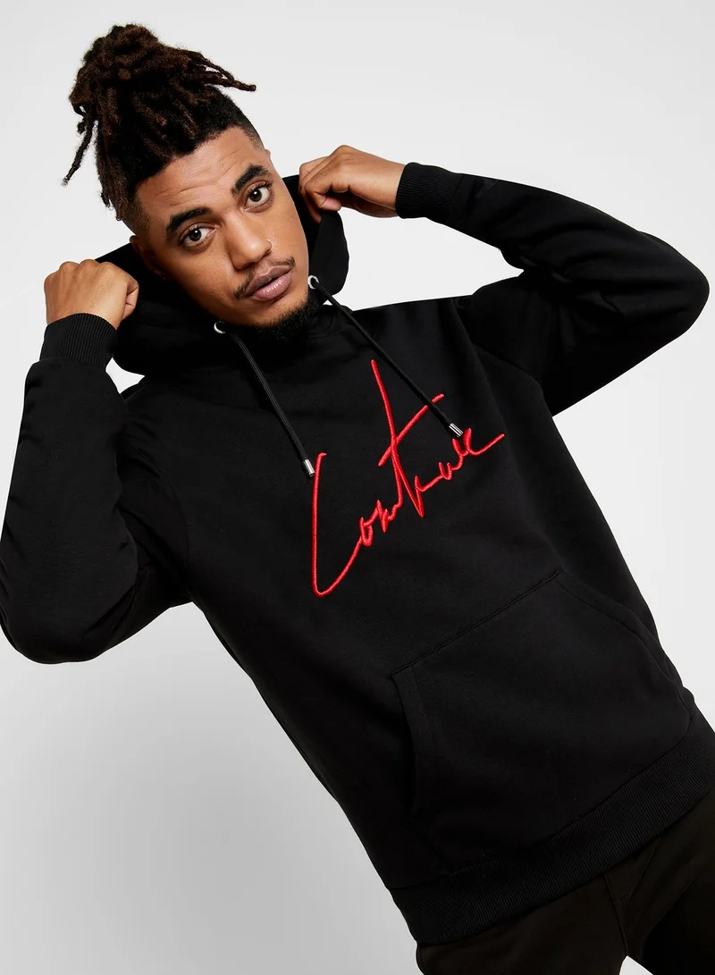 the couture club Essential Hoodie