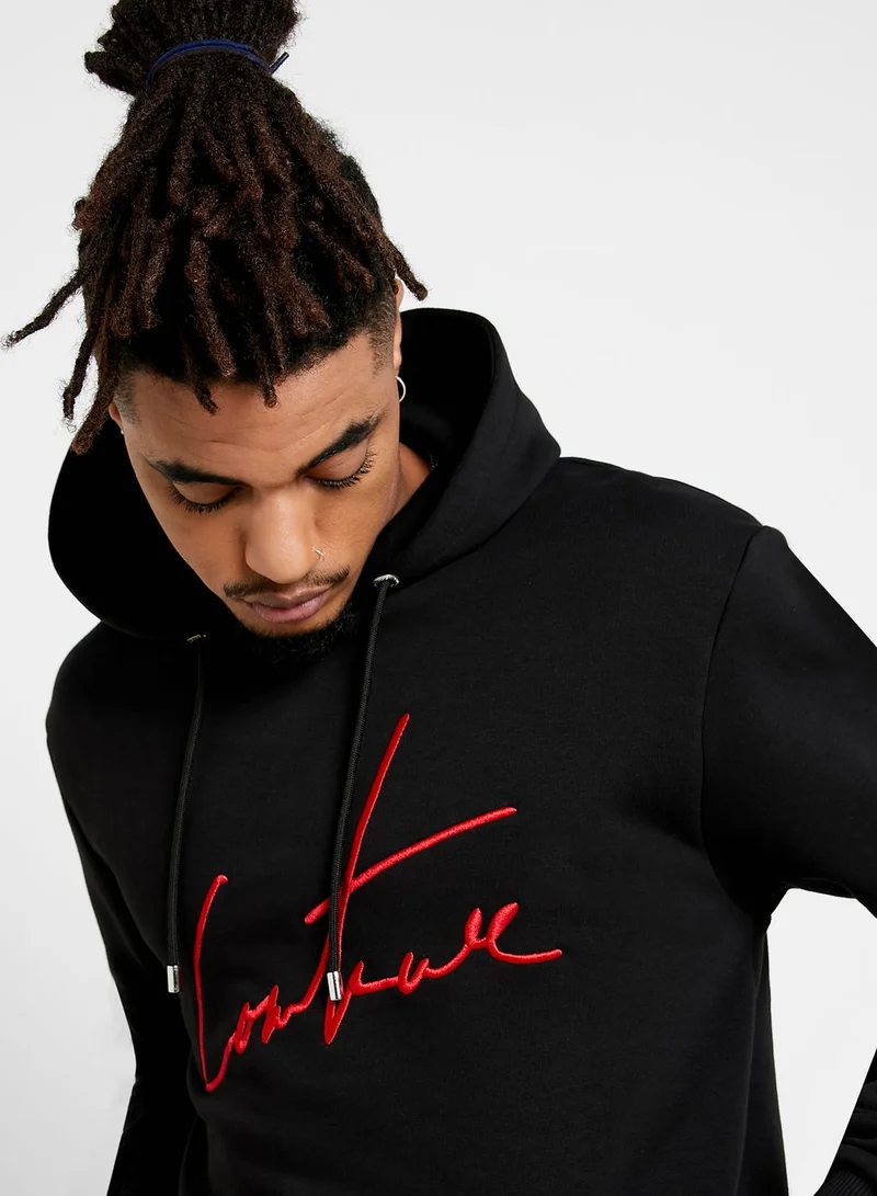 the couture club Essential Hoodie