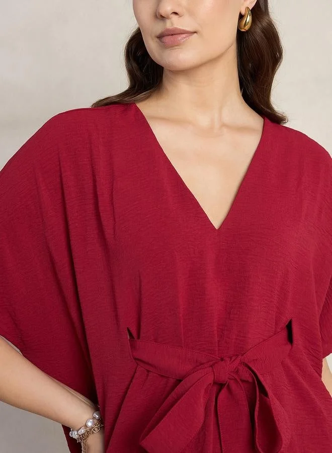 Femmella  Femmella Solid V-Neck Kimono Top with Tie Up Detail for Women | Best Price UAE