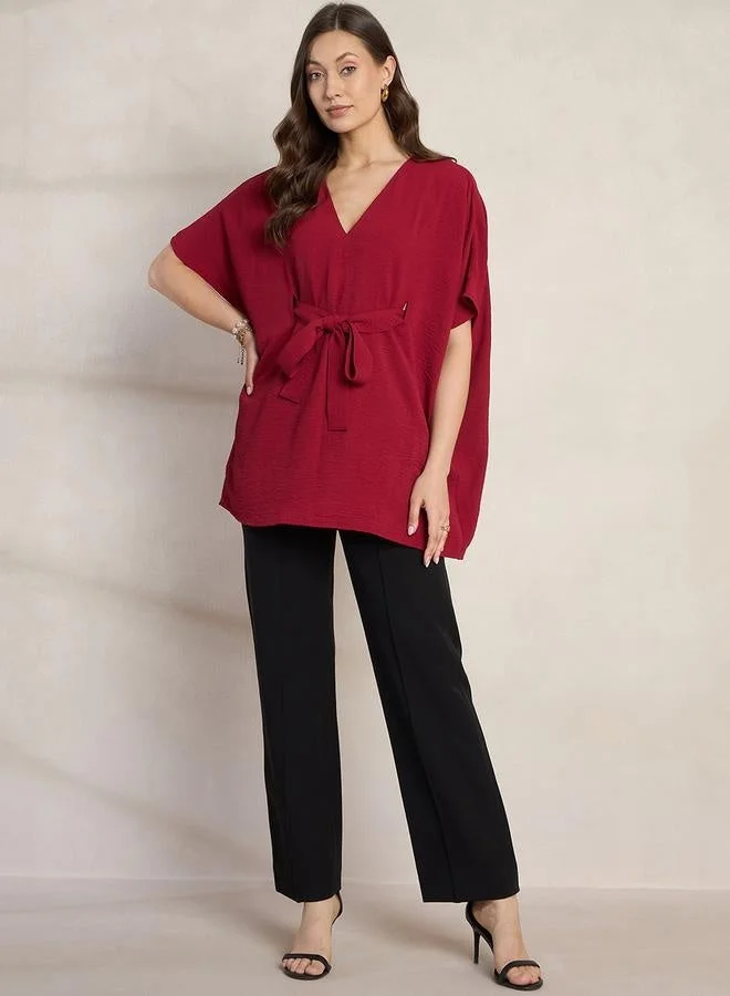 Femmella  Femmella Solid V-Neck Kimono Top with Tie Up Detail for Women | Best Price UAE