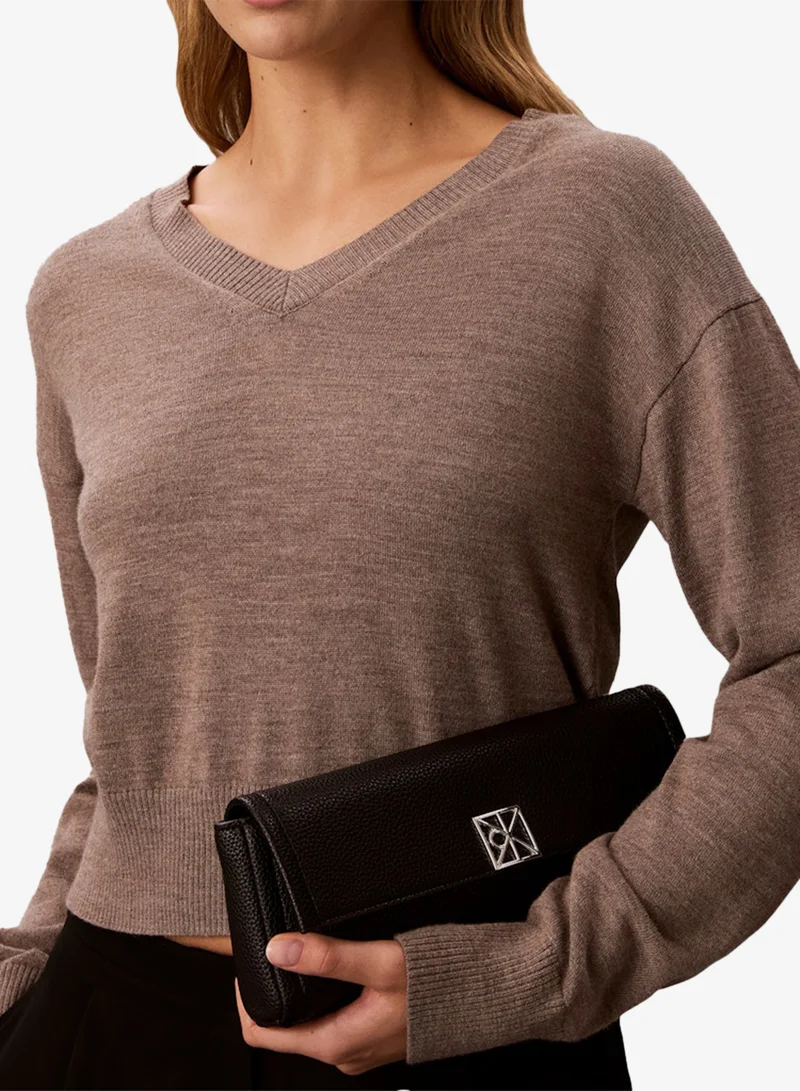 Calvin Klein  Emblem Pebble Grain Chain Strap Clutch for Women | Best Price UAE