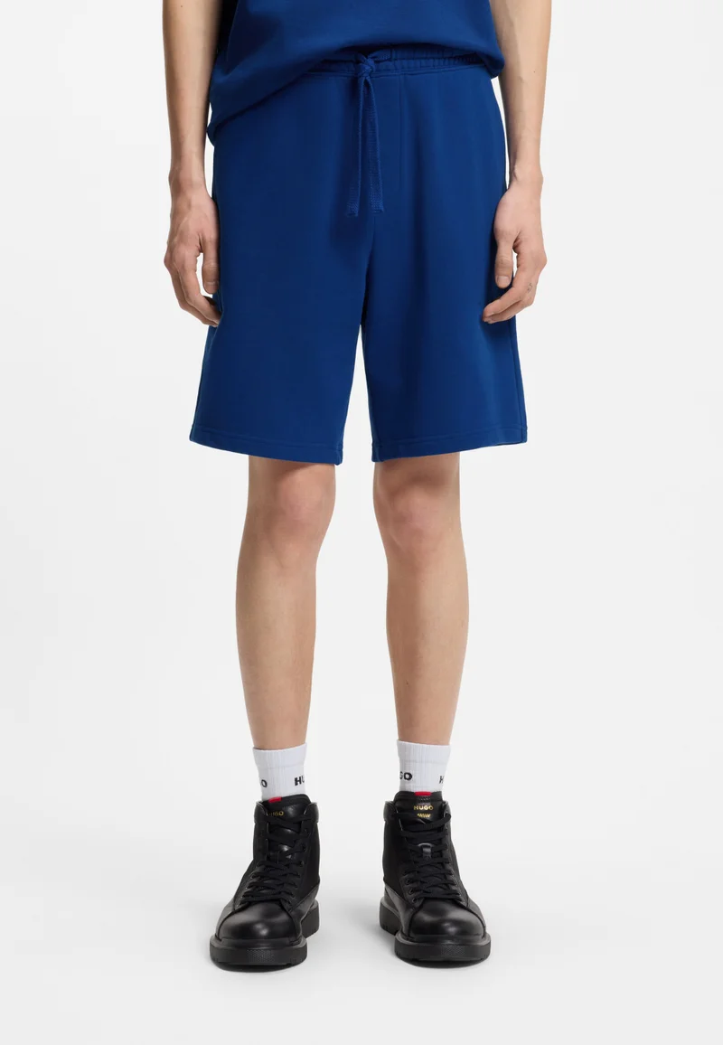 هوجو Cotton-terry shorts with logo print