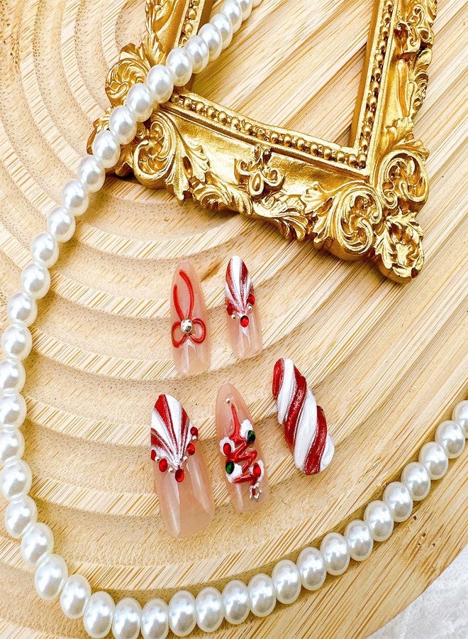 FDSQHSA 30pcs Christmas Press on Nails Medium Almond Fake Nails with 3D Christmas Tree Bow Stripe French Tip Pearl Rhinestones Design Winter White Snowflakes False Nail Xmas Full Cover Glue on Nails for Women - Image 2