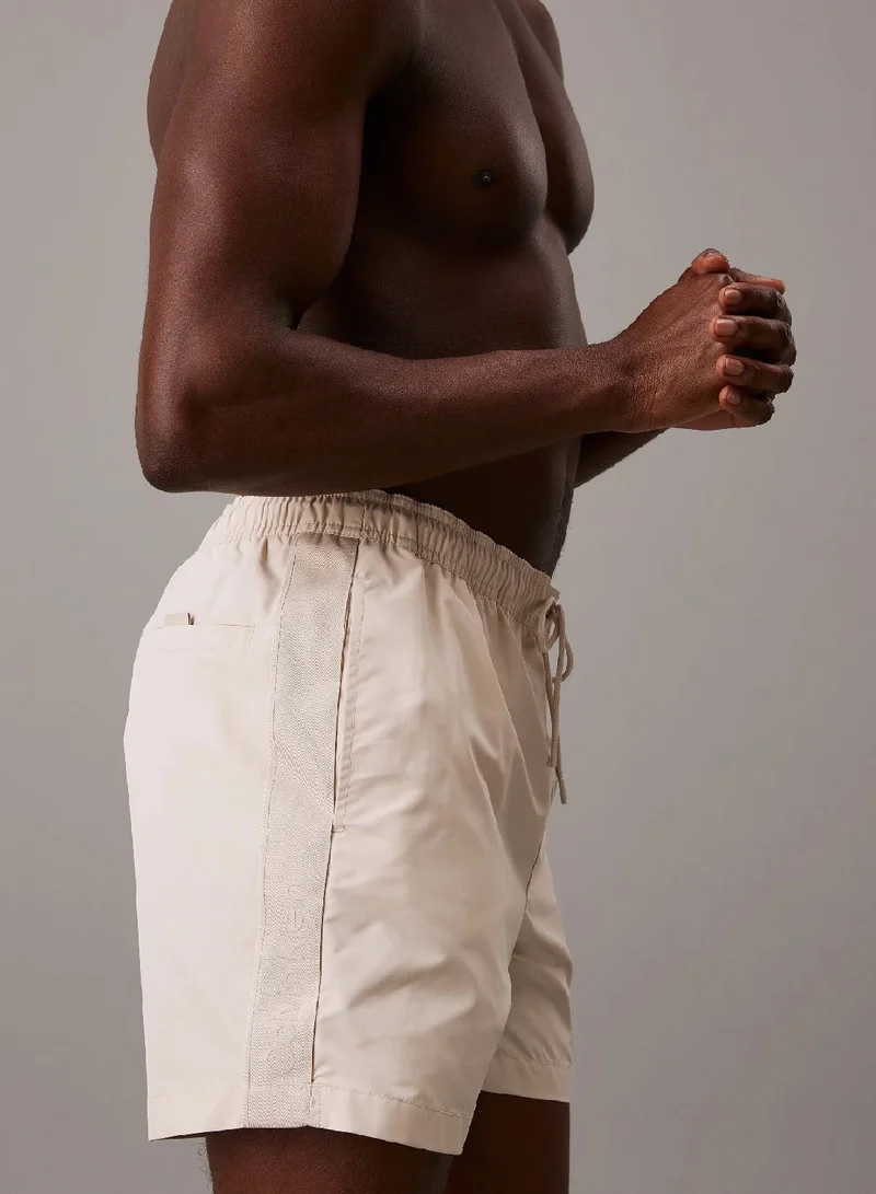 CALVIN KLEIN Stony Beige Medium Drawstring Swim Shorts for Men | Best Price UAE