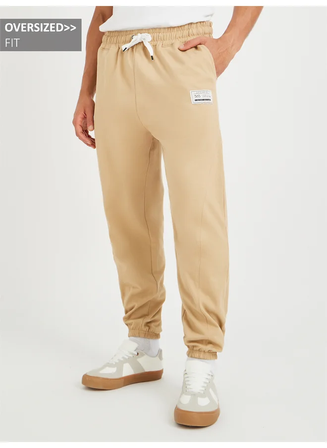 Styli Styli Printed Oversized Jogger with Drawstring