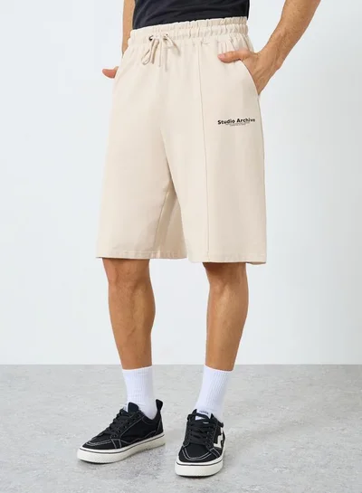 Styli Active Minimal Print Oversized Terry Shorts