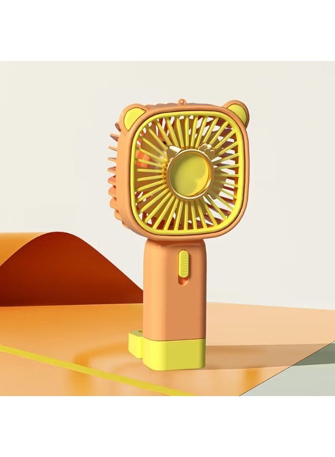 راكسوم مروحة صغيرة محمولة قابلة لإعادة الشحن عبر USB مع حامل (أصفر وبرتقالي) - Image 1