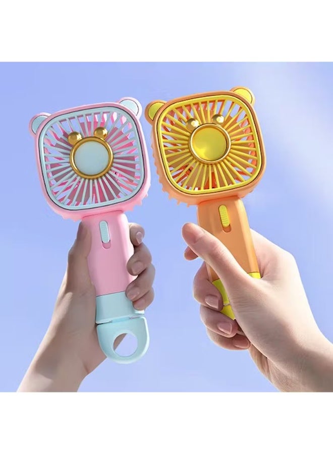 راكسوم مروحة صغيرة محمولة قابلة لإعادة الشحن عبر USB مع حامل (أصفر وبرتقالي) - Image 2