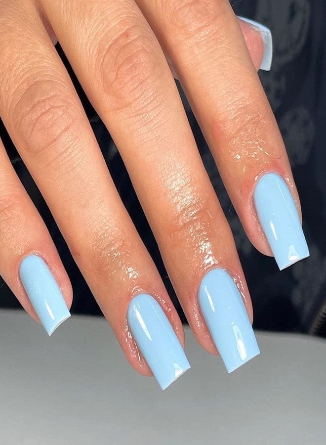 XCREANDO Sky Blue Press on Nails Medium Square Glue on, Short Acrylic Glue on Medium Coffin False Nails for Women, Thick Solid Color Gel 24Pcs - Image 1
