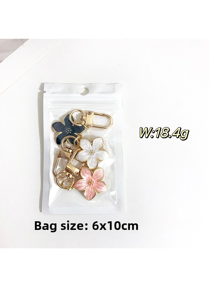 Generic - Cross-border Trade Pearlescent Oil Drop Flower Keychain Sakura Petal Simple Style U Disk Bag airpods Pendant A82 [3 pieces per pack] - Image 1