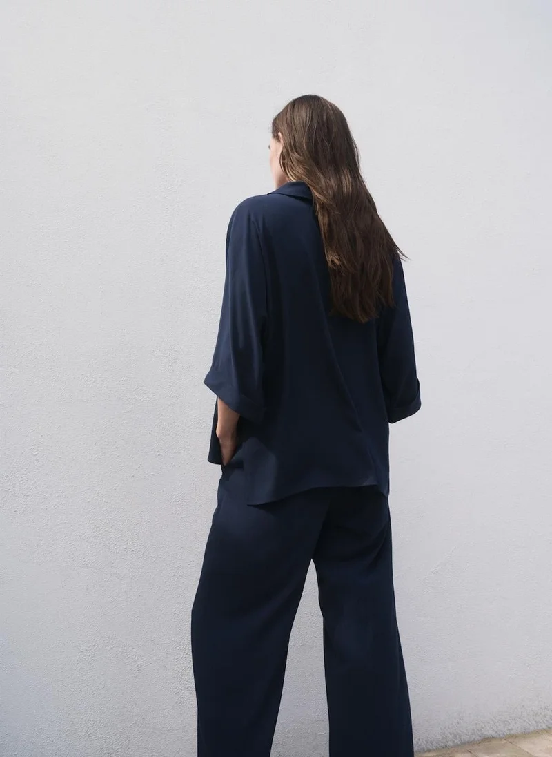 مانجو بلوزة فضفاضة واسعة