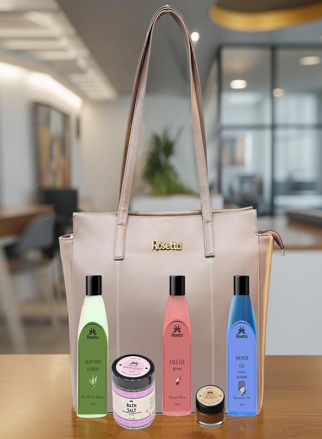 روزيتا مجموعة هدايا روزيتا للعناية بالبشرة الفاخرة مع حقيبة حمل - جل استحمام، لوشن الصبار، جل الوجه بخلاصة النبيذ الأحمر، ملح استحمام بخلاصة الورد، مرطب شفاه بخلاصة الكاكاو - مجموعة تدليل 5 في 1 للنساء - لون وردي نيود - Image 1