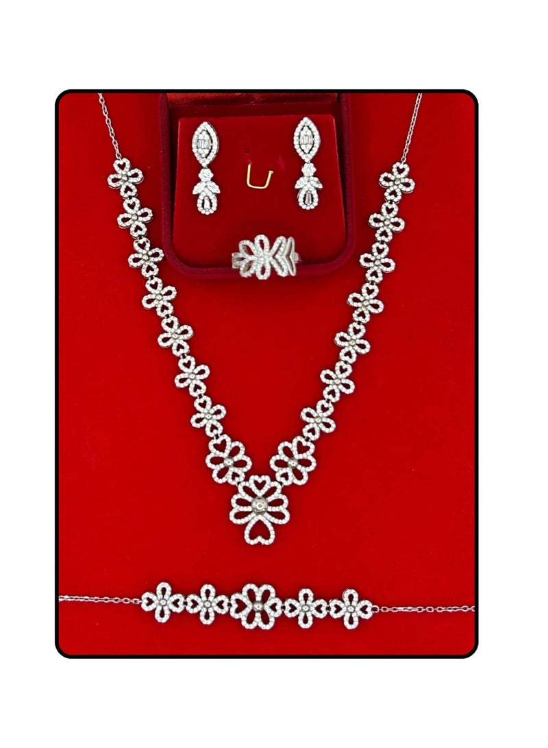 Armaaj Bridal jewelry set featuring a floral inspired necklace,earrings ,a ring and bracelet - Image 1