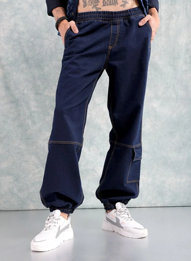 Men Loose Fit Solid Mid-Rise Stretchable Denim Joggers