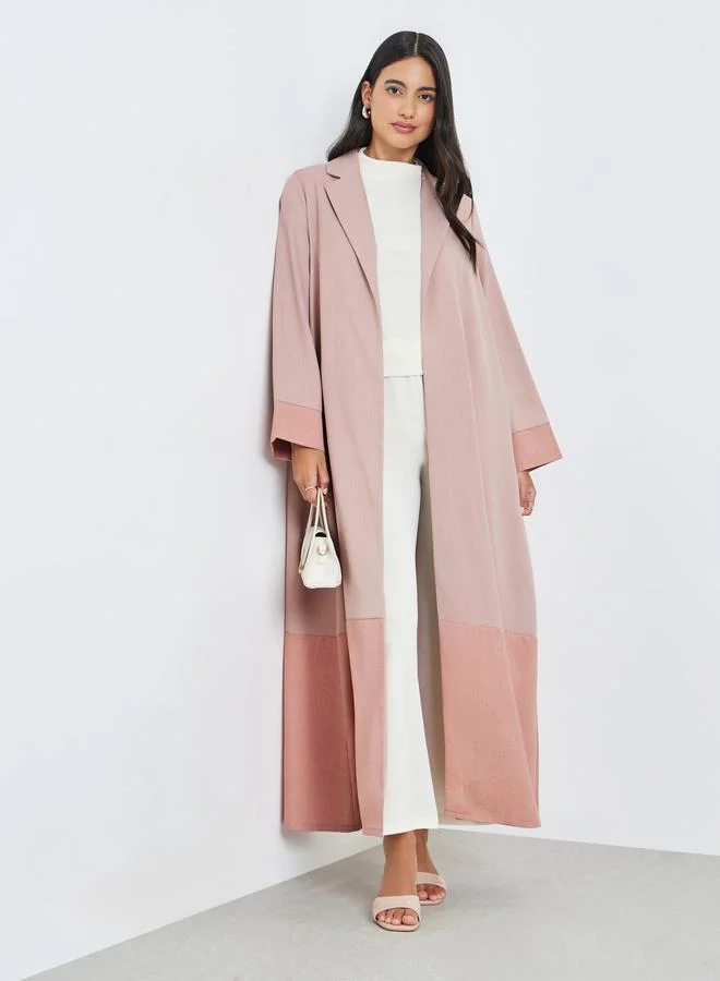 أميرة عباية بحافة واسعة ونمط كتل الالوان