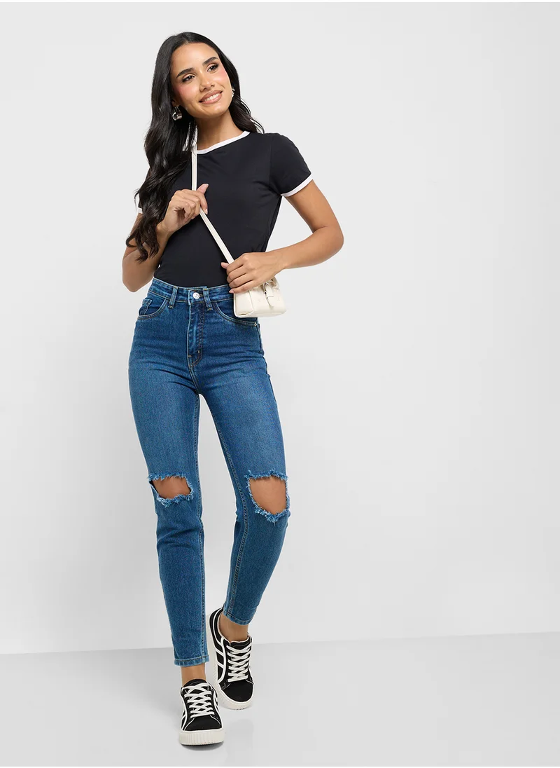 جينجر Distressed High Rise Skinny Jeans