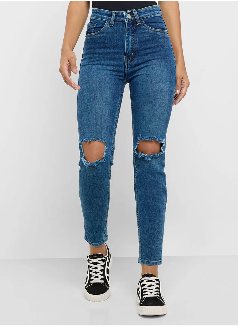 جينجر Distressed High Rise Skinny Jeans