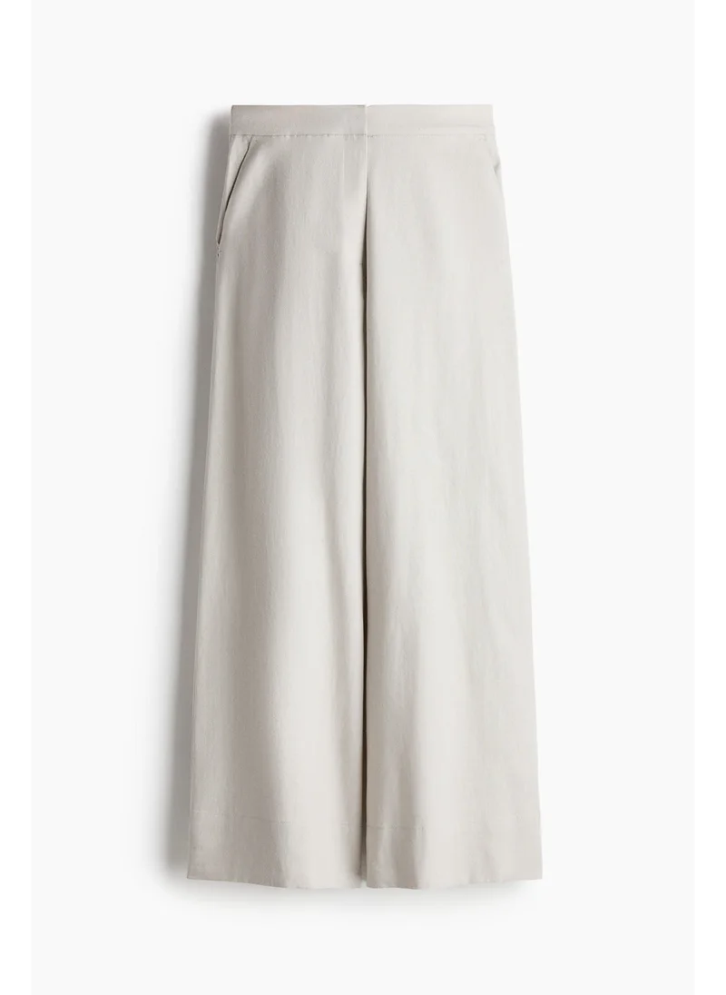 اتش اند ام Wide linen-blend trousers