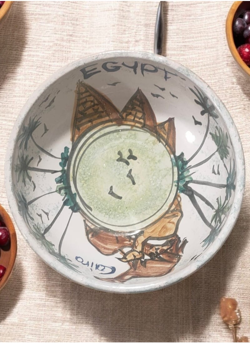 Hand-painted pottery and porcelain casserole that can withstand direct and indirect heat, flame or oven.