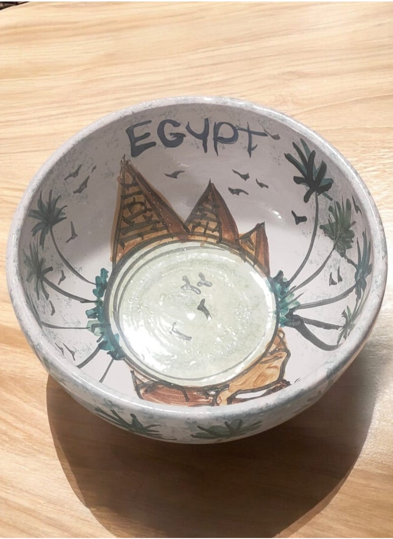 Hand-painted pottery and porcelain casserole that can withstand direct and indirect heat, flame or oven.