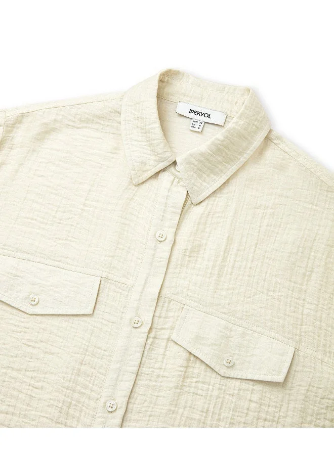 ابيكول قميص بنقوش