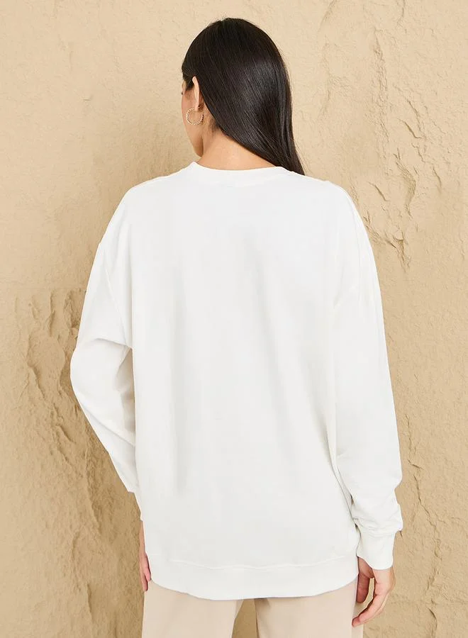 Styli Regular Fit Longline Slogan Embroidered Sweatshirt