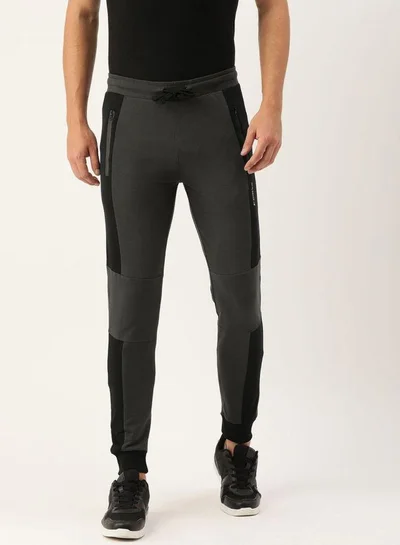 ذا انديان كراج كو Men Slim Fit Solid Mid-Rise Stretchable Knitted Jogger Trousers