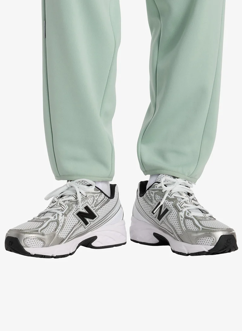 New Balance MOSAIC GREEN (MCN) Bukatsu Knit Tapered Pants for Women | Best Price UAE