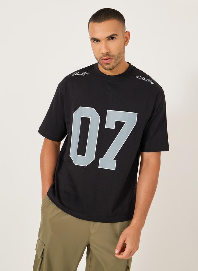 Styli Varsity Printed Jersey Oversized T-Shirt  - Image 1