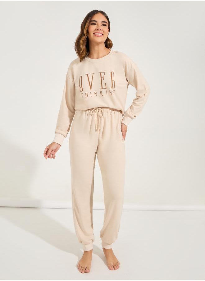 Styli - Overthinking Slogan Print Sweatshirt & Jogger Lounge Set - Image 1