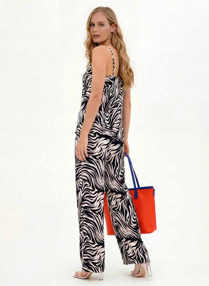 جانارا جونز Zebra Print Satin Camilla Set