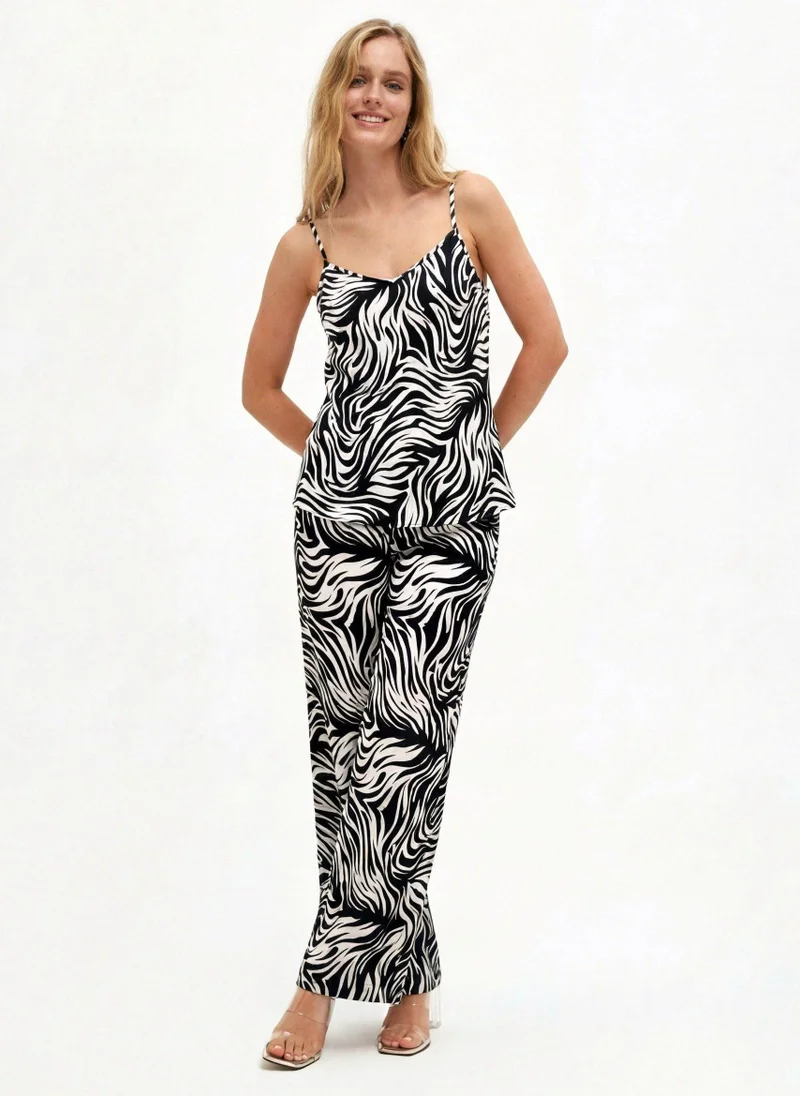 جانارا جونز Zebra Print Satin Camilla Set