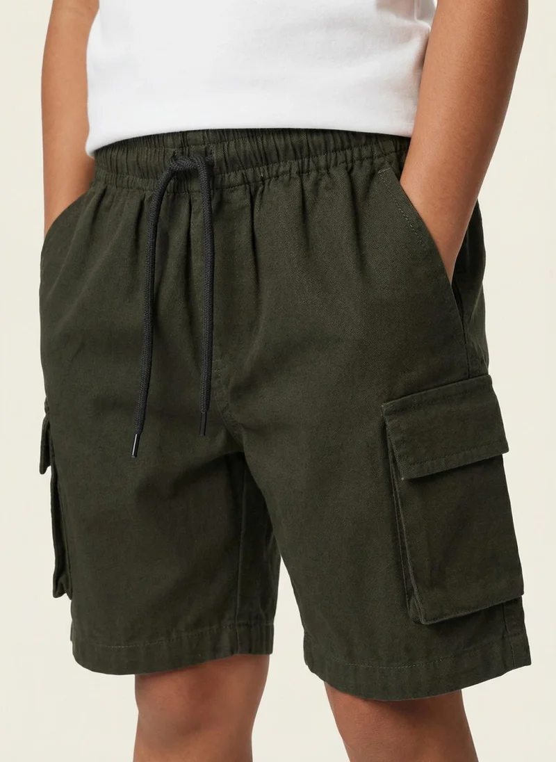 نوتيناتي Nautinati Boys’ 100% Cotton Woven Solid Multi-pocket Cargo Shorts