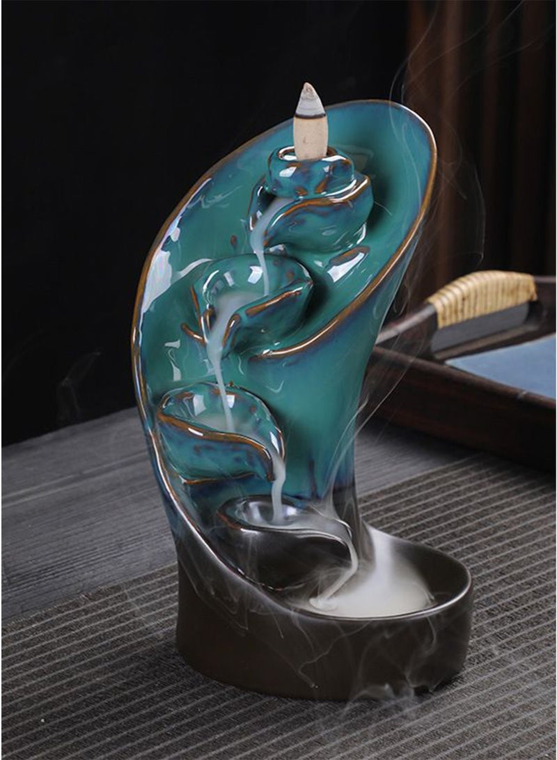 محرق معطر خزفي يعيد تدفق الدخان. يوجد على جانبيه مصادر مثل بلوط الحجارة والجداول الجبلية والمآب الجارفة. هو أيضًا زخرفة محرق معطر بالدفق العكسي. - Image 1