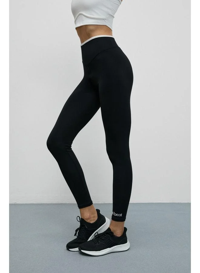 Urban Beat  VELTREN Women’s Stretchy, Soft-Textured Contrast-Piped Black Leggings. for Women | Best Price UAE