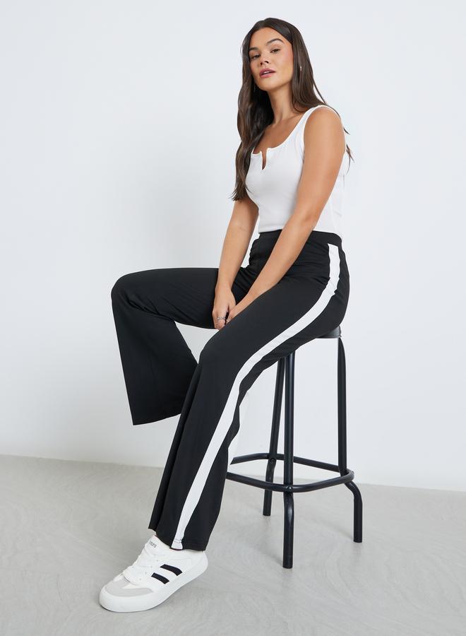 ستايلي بنطال مخطط بقصة أرجل واسعة - Image 1