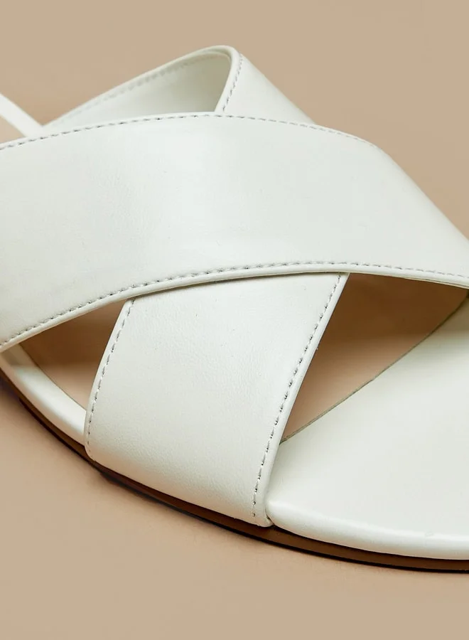 فلورا بيلا من شو إكسبرس Women's Cross Strap Slip-On Sandals with Block Heels
