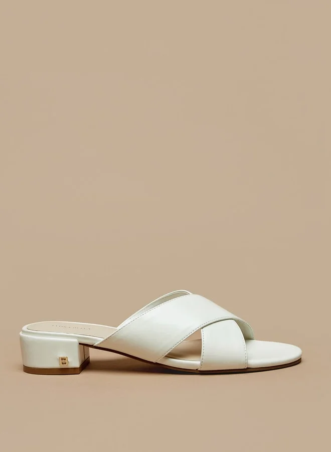 فلورا بيلا من شو إكسبرس Women's Cross Strap Slip-On Sandals with Block Heels